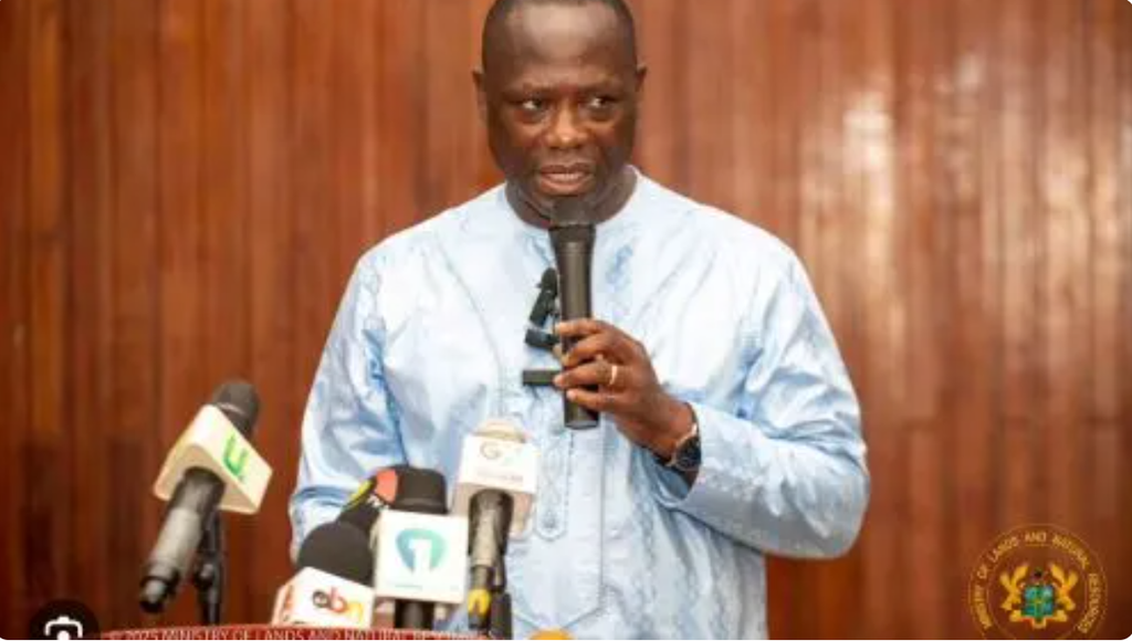 Lands Minister speaking at a press briefing